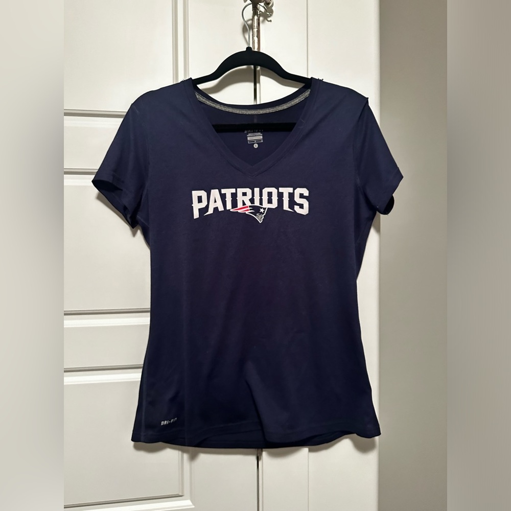 Nike Patriot’s shirt.